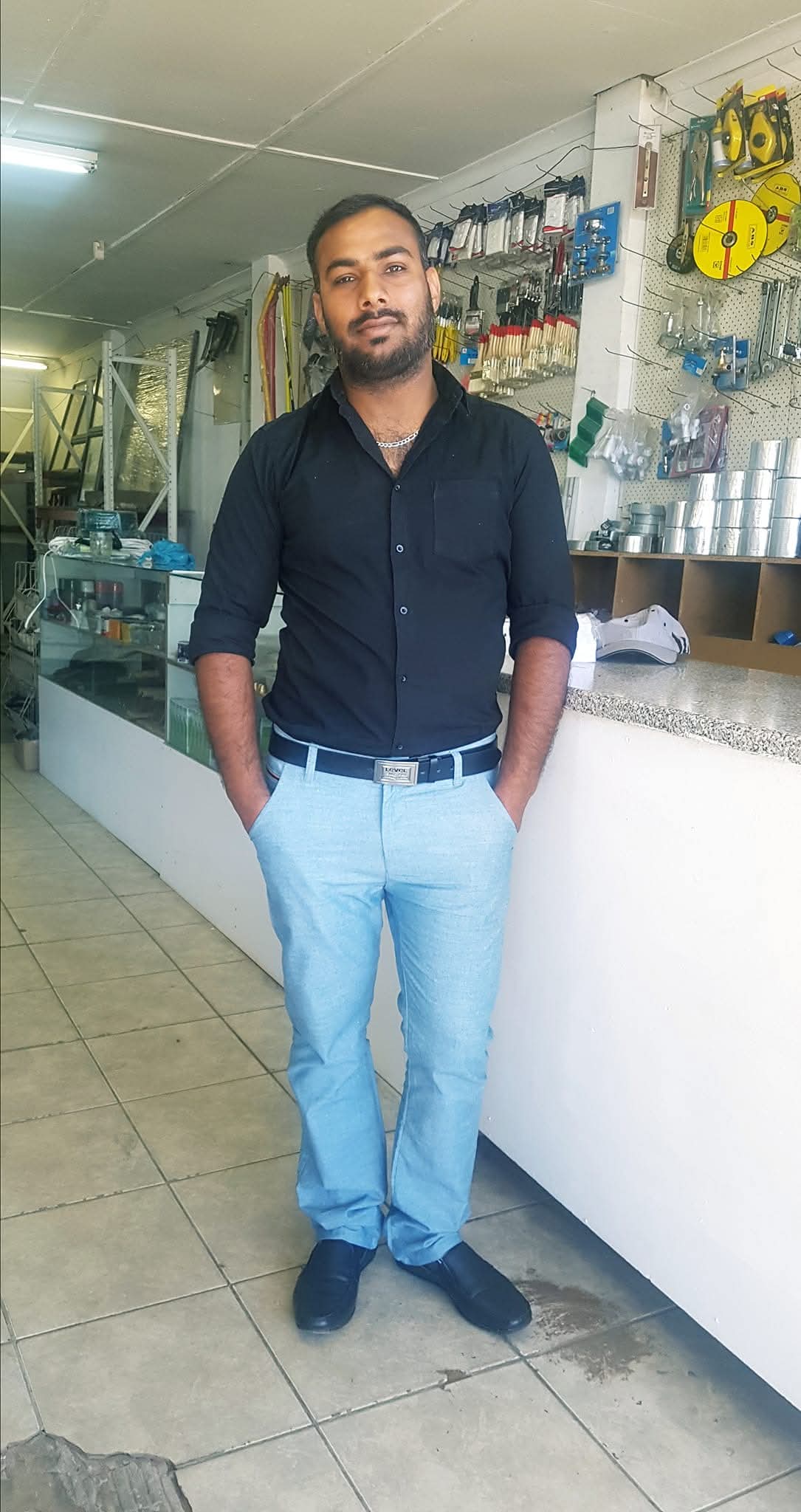 Hafiz Rizwan Akram, owner of Master Plywood, inside the shop